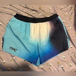 Tres Piñas running shorts size L